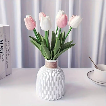 Vase blanc avec tulipes