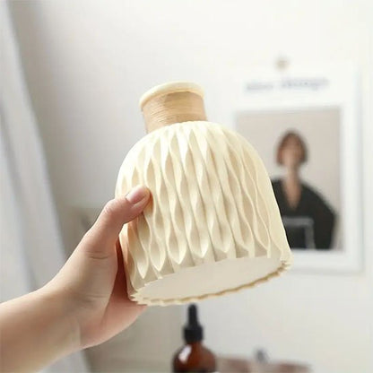 Vase taille comparé à une main